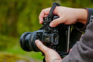 How to put on a camera strap
